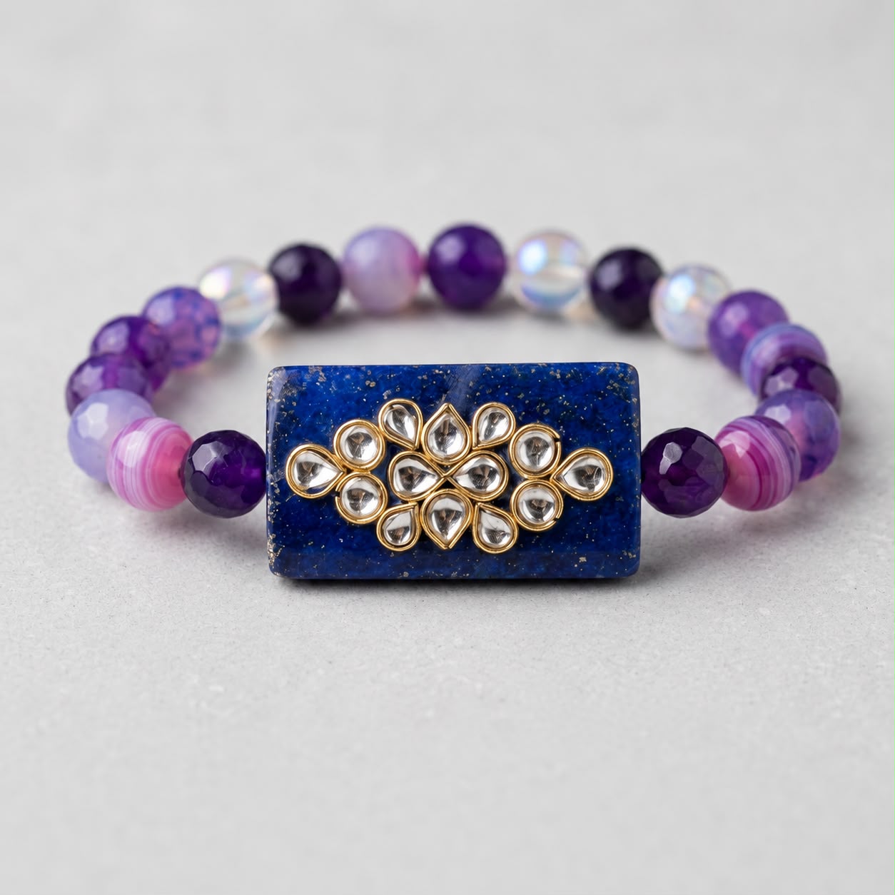 Kundan Bracelet Rakhi with Blue Centrepiece & Natural Gemstones