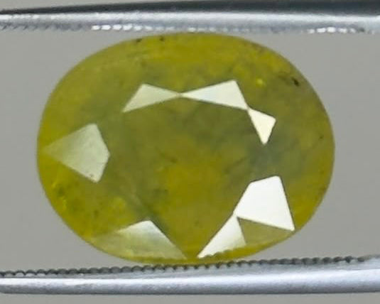 Bi-Color Yellow Sapphire (Pitambari) – 10.21 Carat Oval Cut, Heated| Gemkrishna