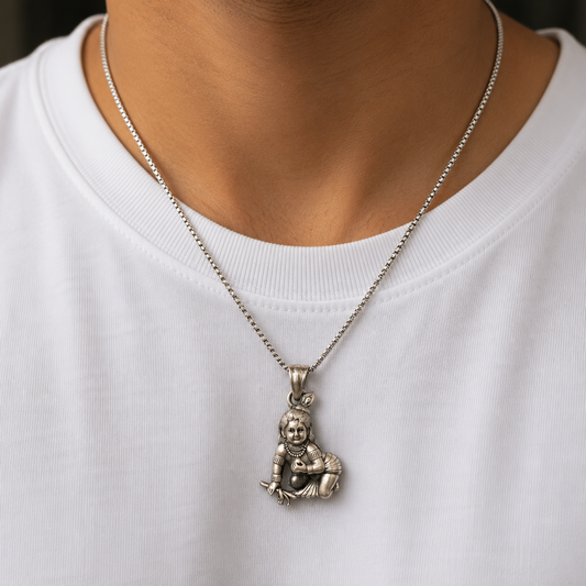 925 silver Bal Krishna laddu Gopal pendant worn on a thin silver chain