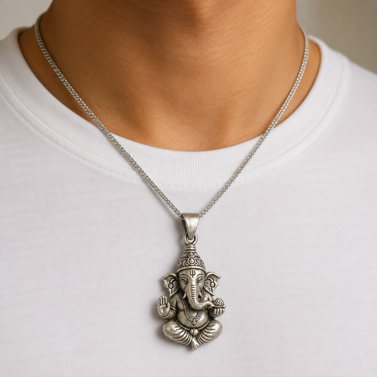925 silver Lord Ganesha pendant worn on a fine silver chain over a white shirt