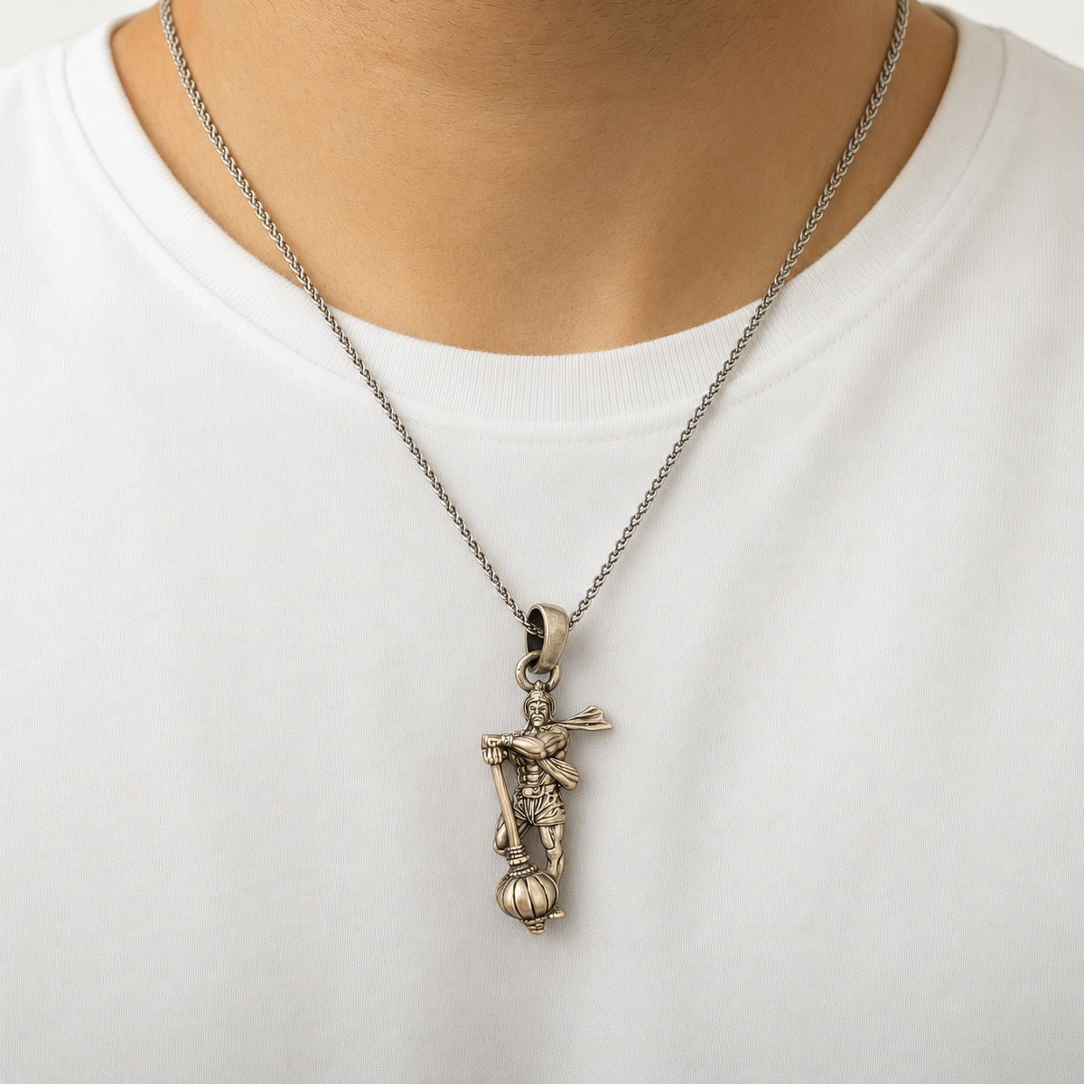 925 silver Mahabali Bhim gada pendant on a chain worn on a white shirt