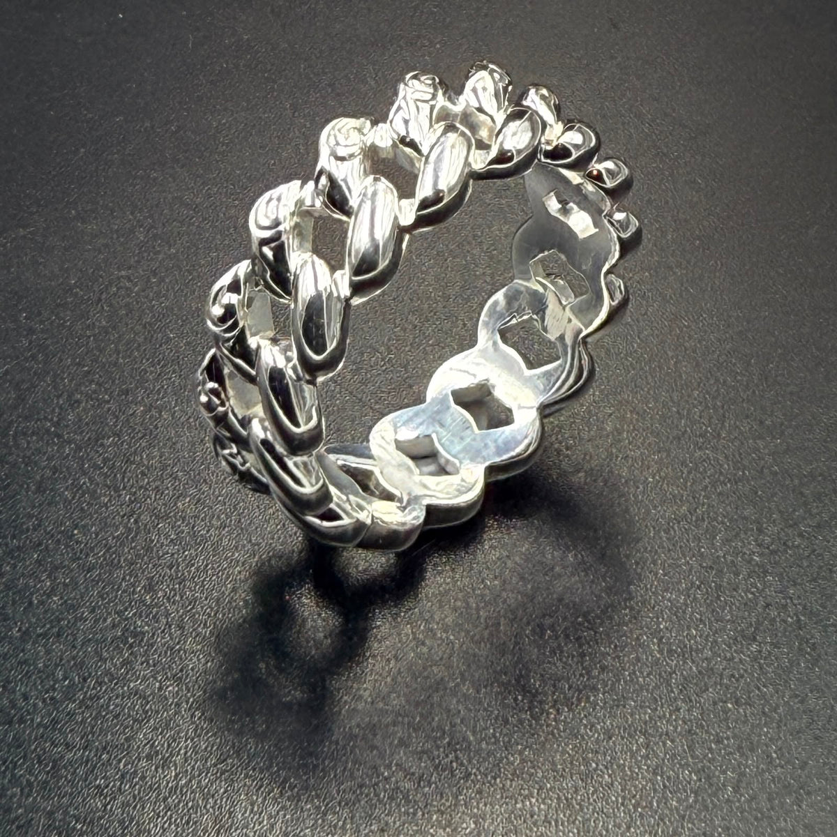 925 sterling silver openwork band ring with interlocking flame and scale motif, high-polish finish