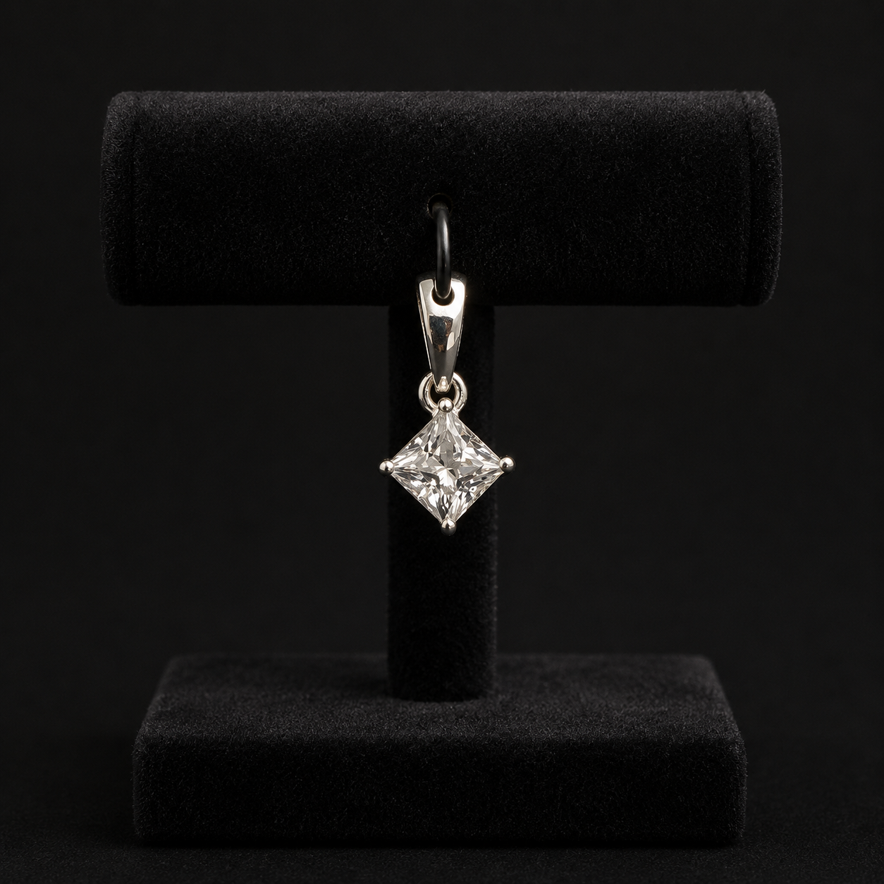 Back view of 925 silver moissanite princess cut solitaire pendant on a black jewelry stand