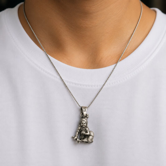 925 silver Bal Krishna laddu gopal pendant worn on a fine silver chain