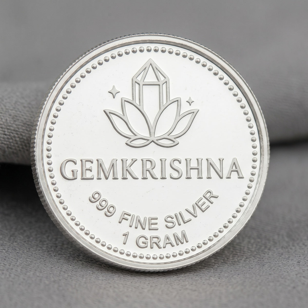 GemKrishna 999 fine silver coin with lotus and star design, 1 gram
