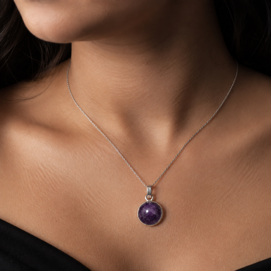 Natural amethyst cabochon pendant in German silver worn on a silver chain necklace