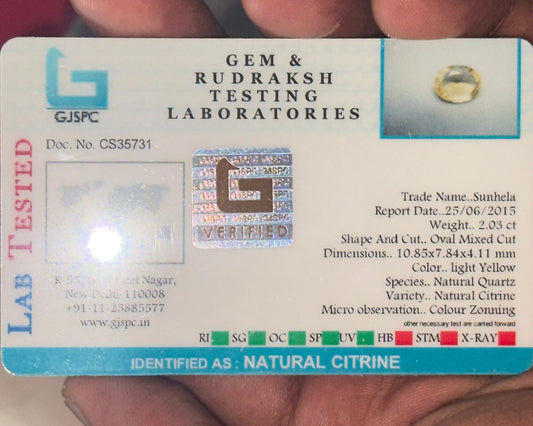 Natural citrine testing laboratory card labeled Gem and Rudraksh Testing Laboratories