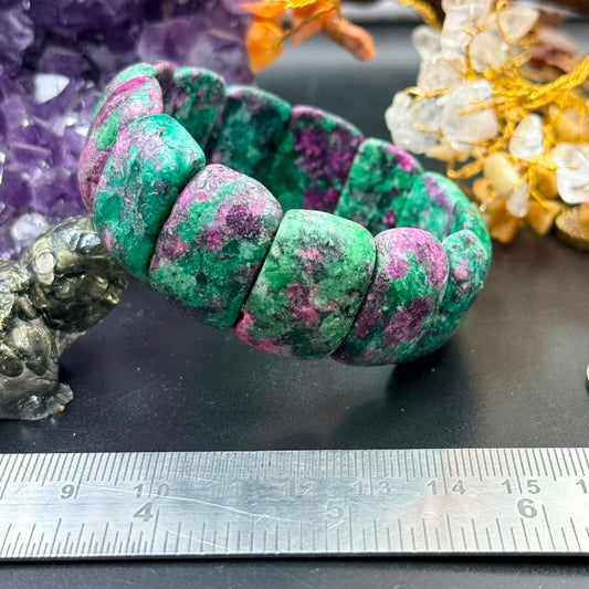 Ruby zoisite curved rectangle bead bracelet showing vivid green and magenta stone panels