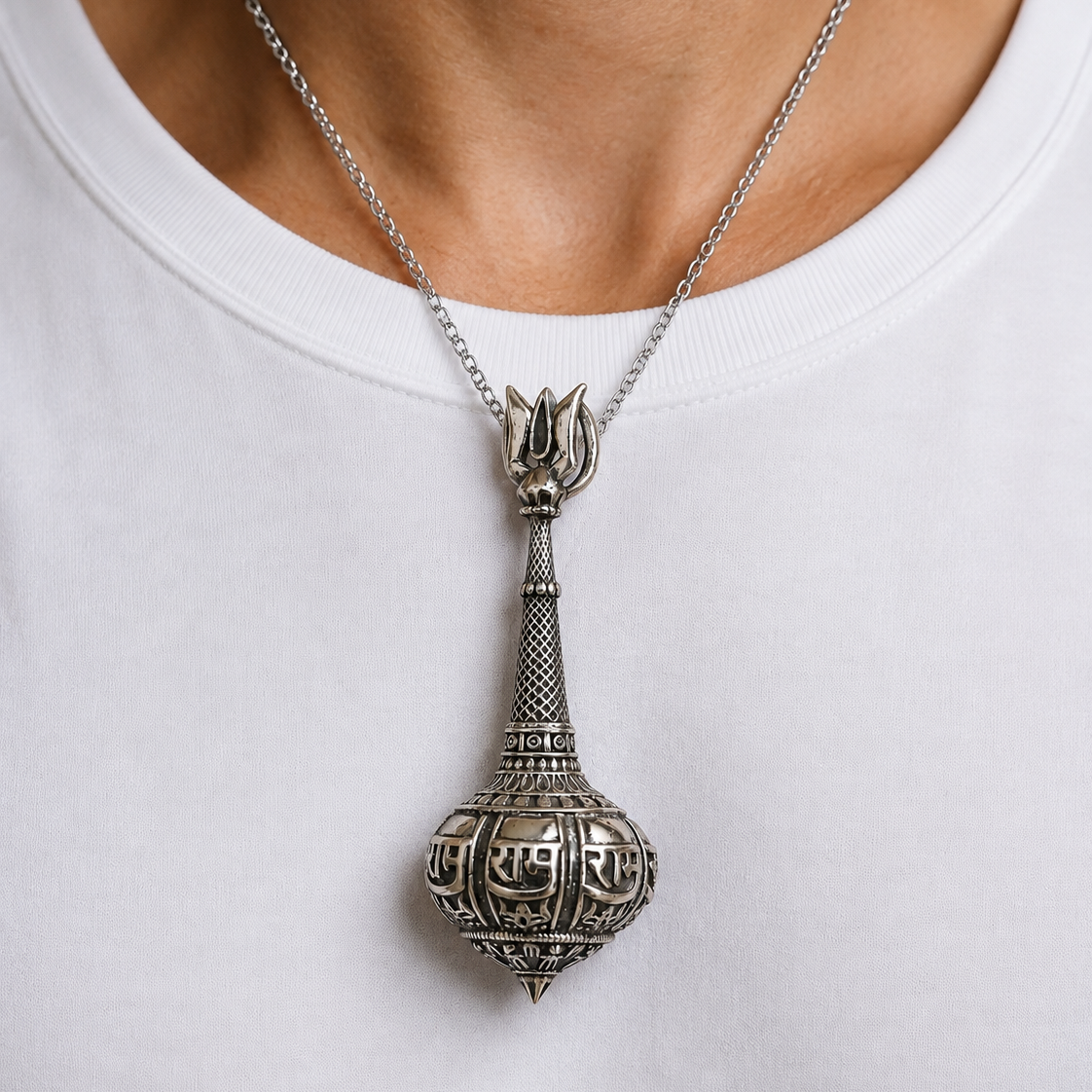 Silver Hanuman gada trishul pendant locket worn on a chain