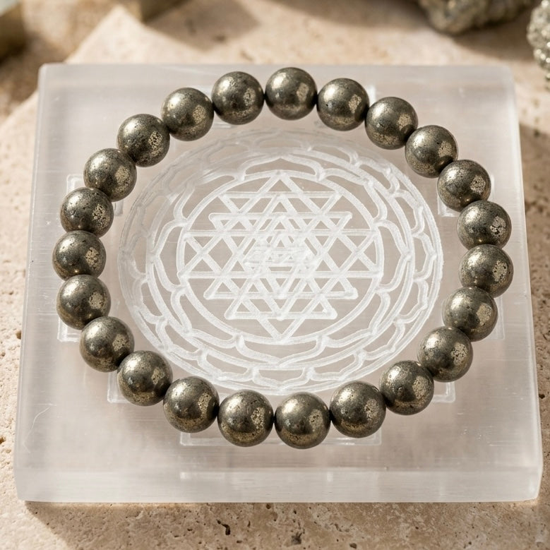 Natural 8mm Pyrite bracelet with a 3x3 inch Selenite charging plate for abundance