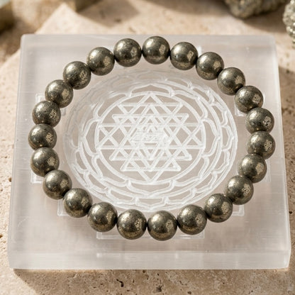 Natural 8mm Pyrite bracelet with a 3x3 inch Selenite charging plate for abundance
