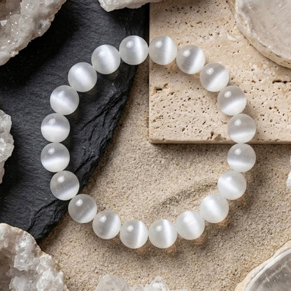 Natural Selenite gemstone bracelet with a soft luminous glow on a wrist
