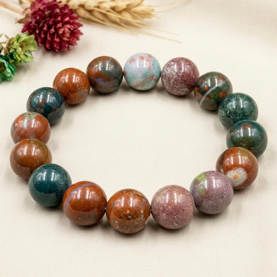 Bloodstone Bracelet with round polished beads in mixed earthy tones of green, red, and brown