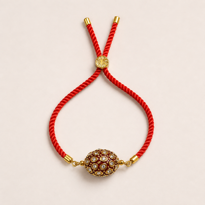 Red Kundan Rakhi for Brother with Gold-Tone Centrepiece and Adjustable Braided Thread