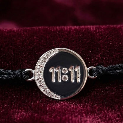 Silver 11:11 angel number rakhi bracelet with black enamel and rhinestone border