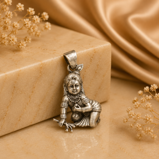 925 silver Bal Krishna laddu Gopal pendant with bell bail on beige background