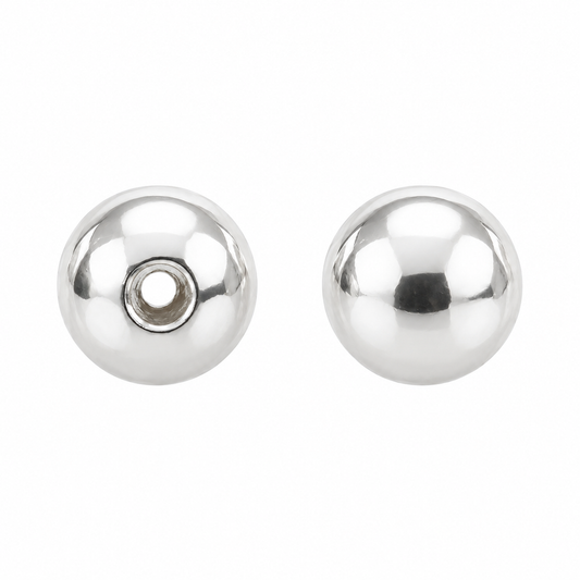 Two round 925 silver beads, 4 mm, one showing the stringing hole