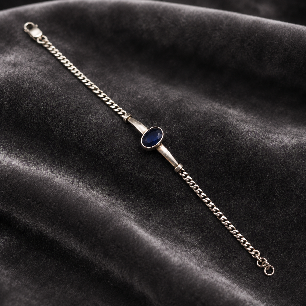 Back view of 925 silver blue sapphire neelam bracelet with teardrop gemstone clasp