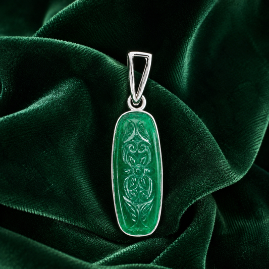 925 silver carved green onyx pendant with ornate leaf design on velvet background