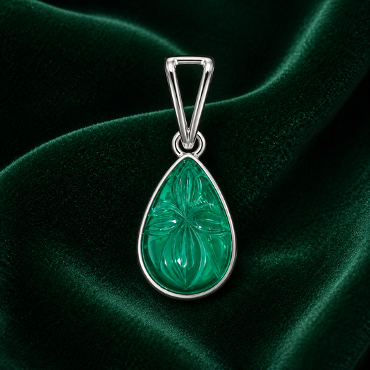 925 silver teardrop green onyx pendant with carved leaf pattern on dark green velvet