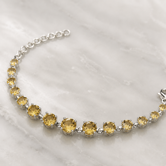 925 silver bracelet with round citrine gemstones in prong settings and a secure chain clasp