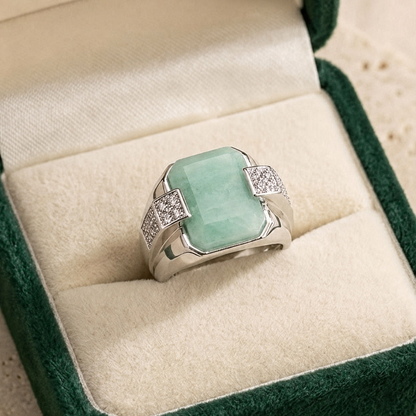925 silver emerald panna ring with square green gemstone and pavé side details on velvet box