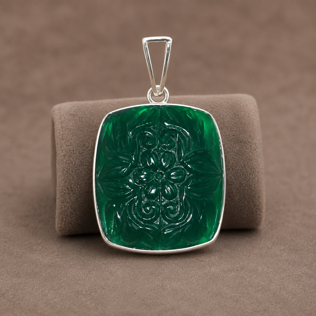 925 silver carved green onyx pendant with balance and renewal motif on a necklace bail