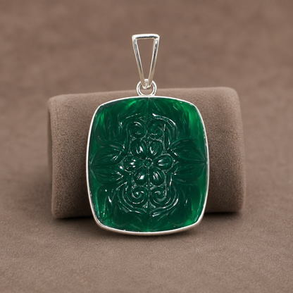 925 silver carved green onyx pendant with balance and renewal motif on a necklace bail
