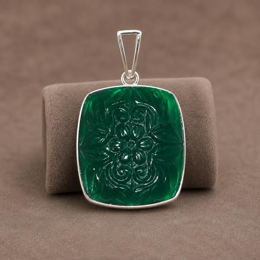 925 silver carved green onyx pendant with balance and renewal motif on a necklace bail