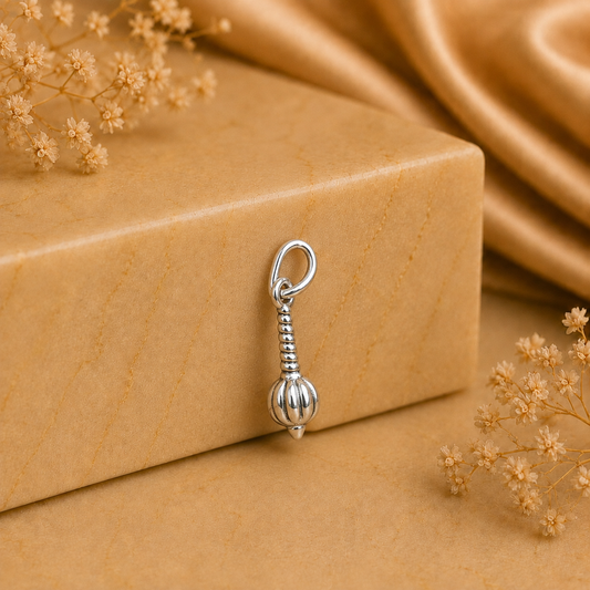 925 silver Hanuman gada locket pendant on a beige gift box with floral decor