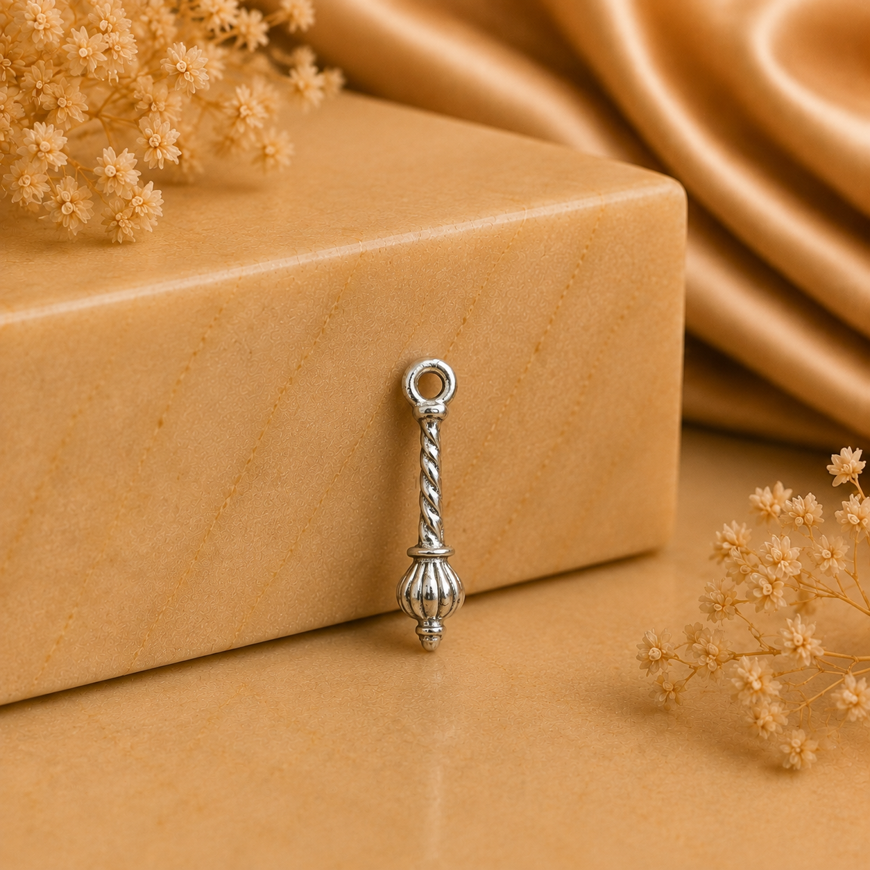 925 silver Hanuman gada locket with spiral handle detail, shown as a small pendant charm