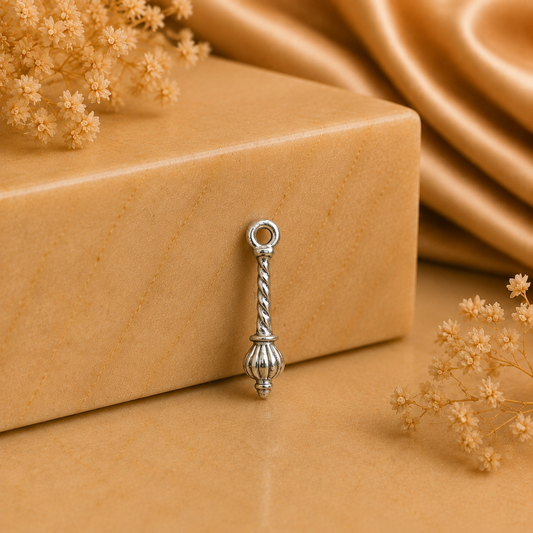 925 silver Hanuman gada locket with spiral handle detail, shown as a small pendant charm