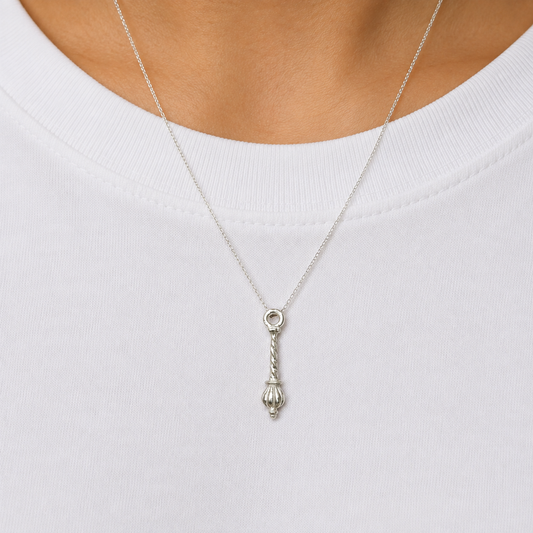 925 silver Hanuman gada locket pendant with spiral handle worn on a chain against white fabric