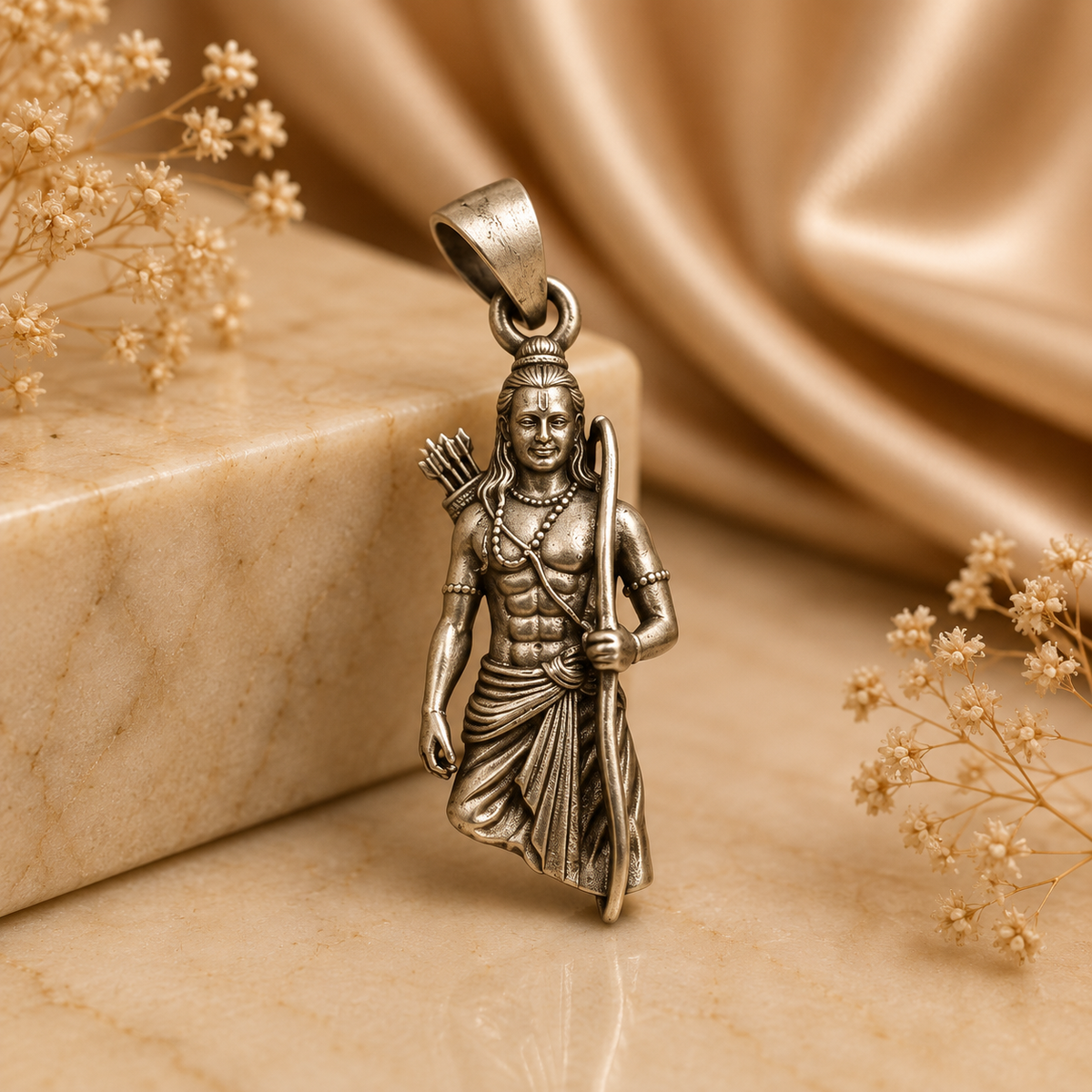 925 silver Lord Ram bow and arrow pendant with bail, front view on beige stone