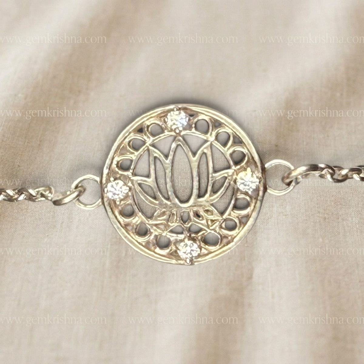 925 silver lotus bracelet with circular lotus motif and chain link detail, close-up front