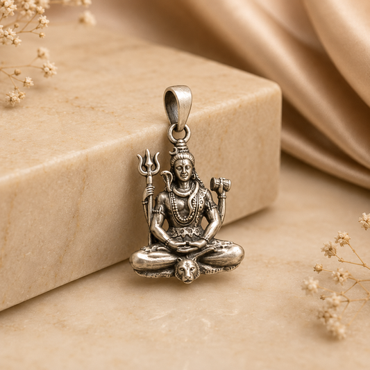 925 silver Lord Shiva meditating pendant with trishul and damru on a textured background