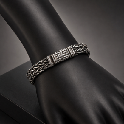 925 silver men’s multi-row braided bracelet on black display with engraved clasp