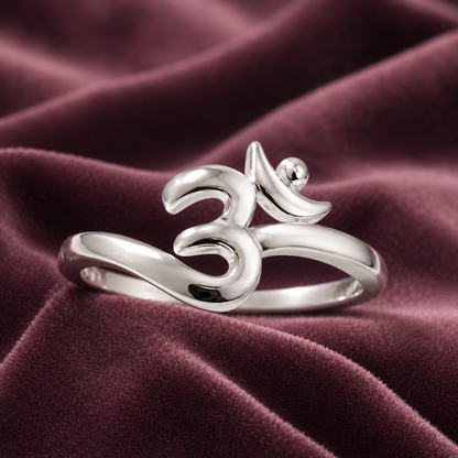 Front view 925 silver om symbol ring on burgundy velvet background spiritual awareness design