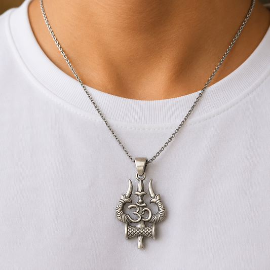 925 silver Om Trishul Damru pendant worn on a silver chain on a white shirt