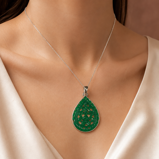 925 silver openwork green onyx teardrop pendant on a chain worn on a model
