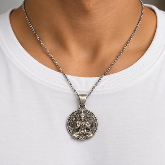 925 silver Ram Naam Hanuman meditation pendant worn on a silver chain over a white shirt