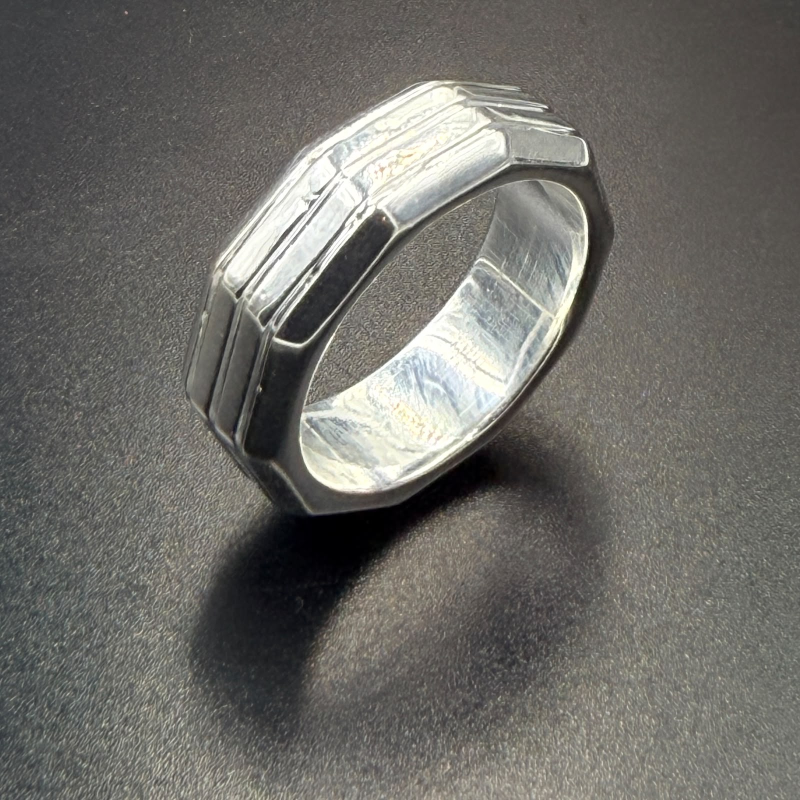 925 sterling silver geometric wide band ring with layered angular ridge design, high-polish finish