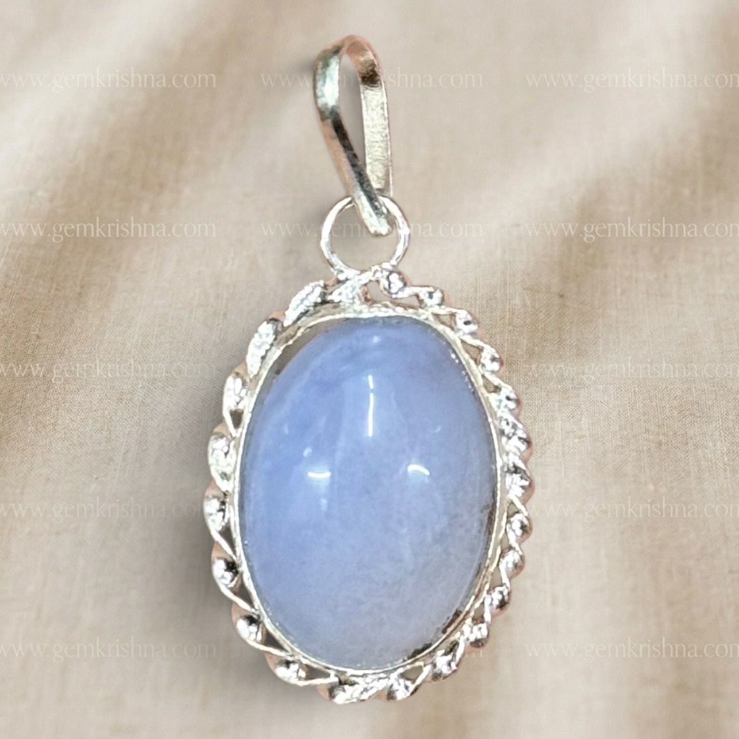 Moonstone pendant in 925 sterling silver with oval blue gemstone and beaded halo setting