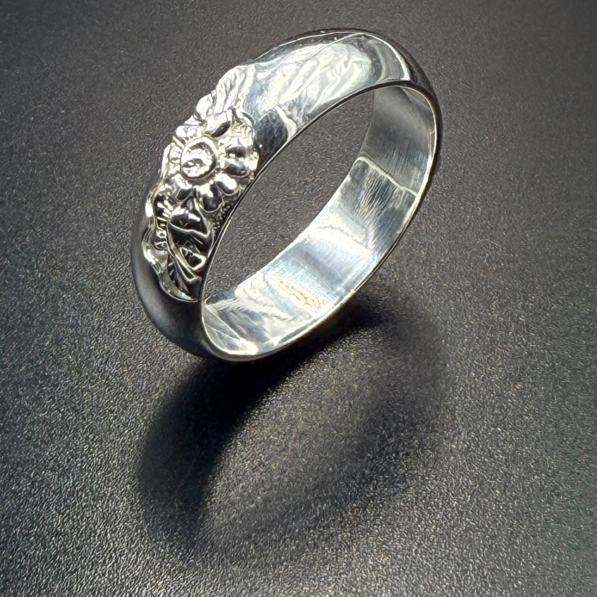 925 sterling silver wide band ring with embossed floral and scroll design, smooth high-polish finish