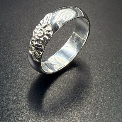 925 sterling silver wide band ring with embossed floral and scroll design, smooth high-polish finish