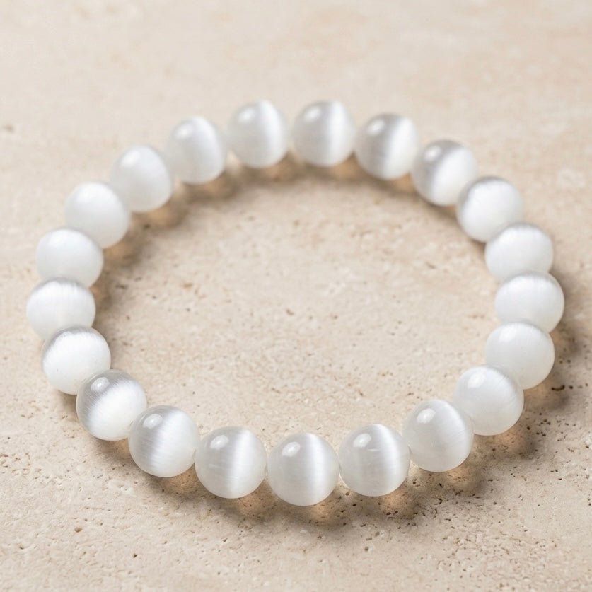 Natural Selenite gemstone bracelet with a soft luminous glow on a wrist