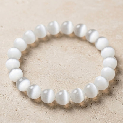 Natural Selenite gemstone bracelet with a soft luminous glow on a wrist