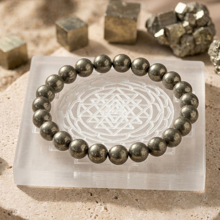 Natural 8mm Pyrite bracelet with a 3x3 inch Selenite charging plate for abundance