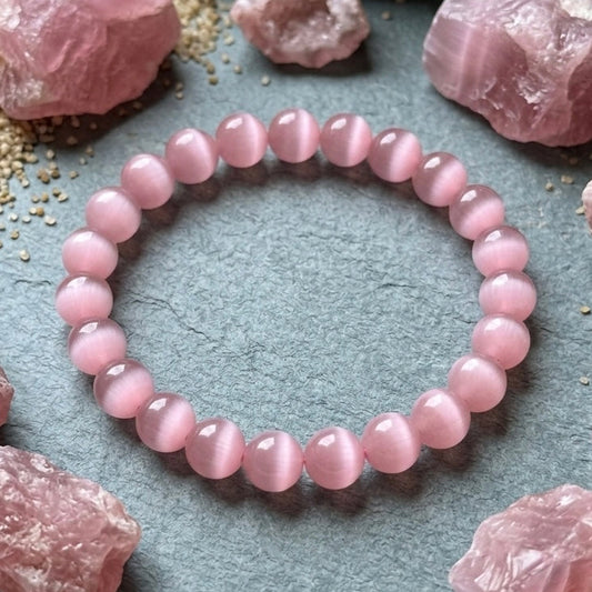 Elegant Pink Selenite bracelet with a smooth, polished finish on a wrist