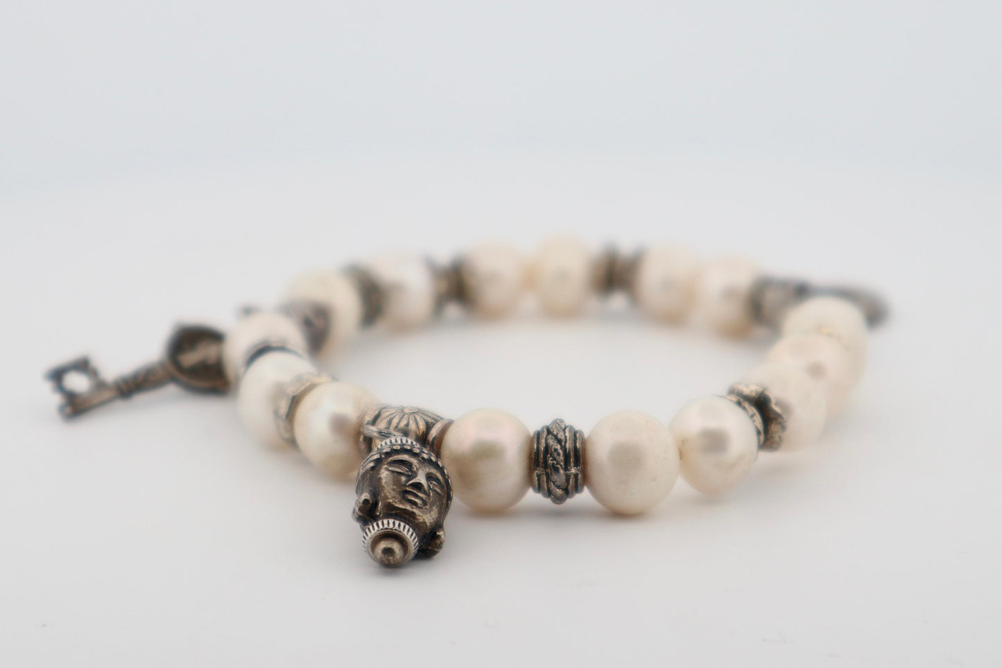 Elegant Pearl Charm Bracelet with Moon, Buddha & Key